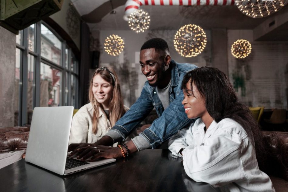 lovely-friends-looking-laptop-indoors